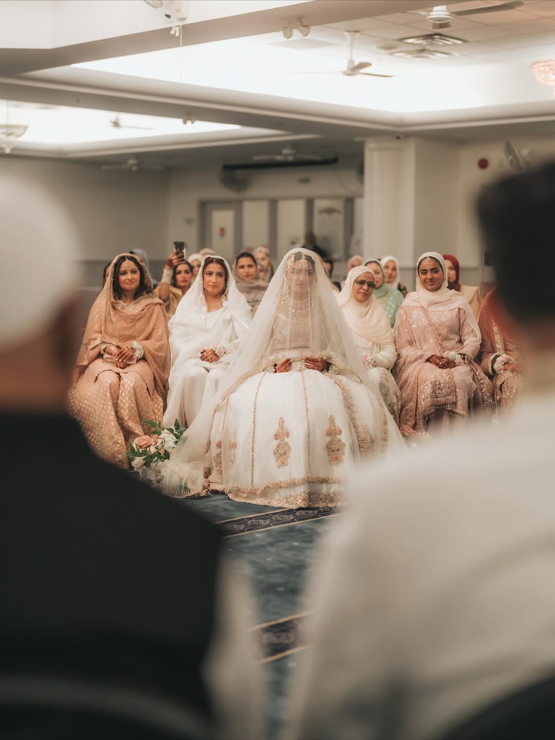 Ivory bridal veil with delicate crystal embellishments and sheer fabric for a Nikkah and South Asian wedding.