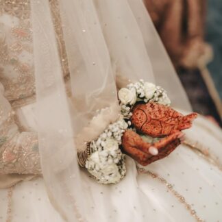 Ivory bridal veil with delicate crystal embellishments and sheer fabric for a Nikkah and South Asian wedding.