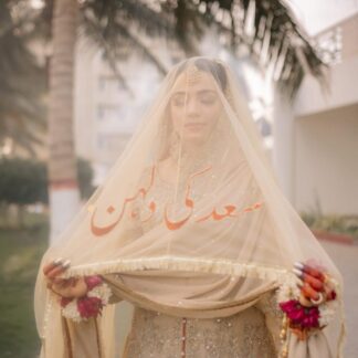 Nikkah Mubarak Dupatta in sheer ivory fabric with Urdu embroidery and elegant gold border for a Pakistani Muslim bride.