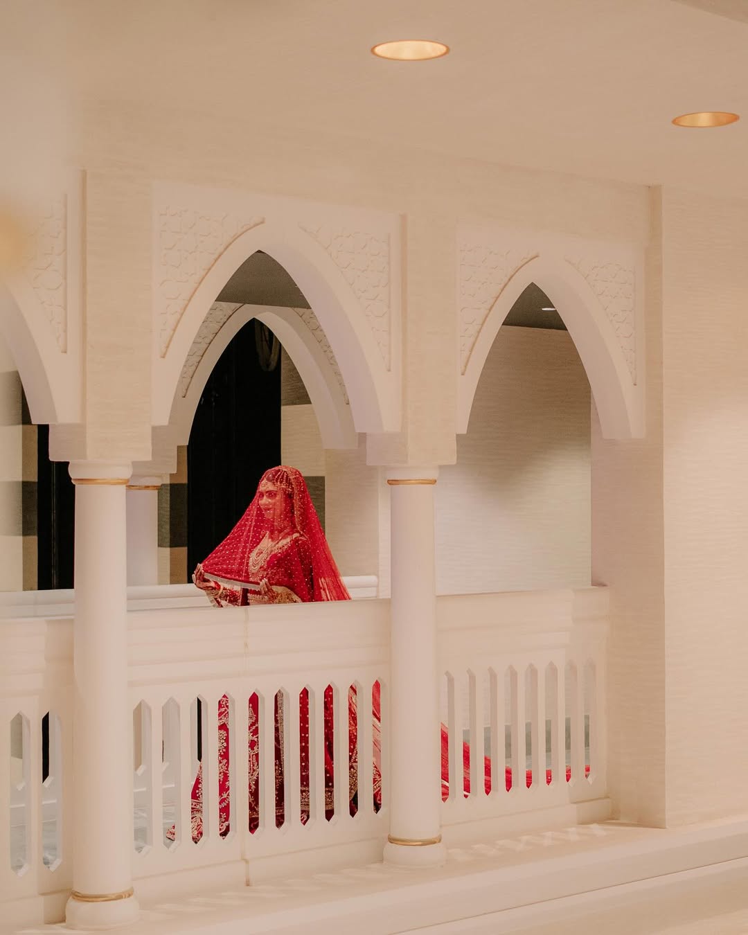 Luxury red embroidered bridal dupatta veil with intricate embellishments and elegant border for Pakistani and South Asian weddings in the USA.