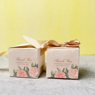 Floral cube wedding favor boxes with Thank You design and satin ribbon for Pakistani, Nikkah and Muslim wedding celebrations.