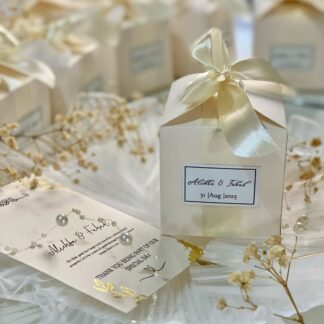 Ivory Nikkah Favor Boxes USA with personalized wedding labels and satin ribbon bows for Pakistani and Muslim wedding celebrations.