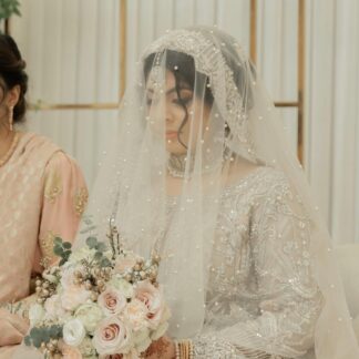 Ivory Pearl Nikkah Dupatta USA with sheer fabric, scattered pearl embellishments and embroidered bridal border for Pakistani brides.