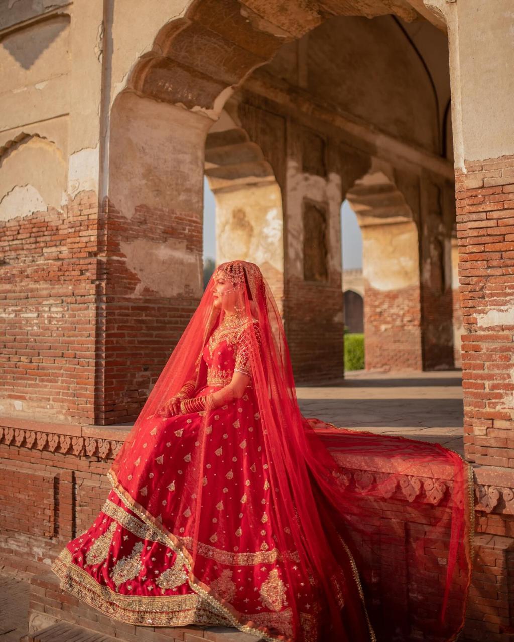 Red Bridal Nikkah Dupatta USA with sheer fabric and elegant gold embellished border for traditional Pakistani wedding celebrations.