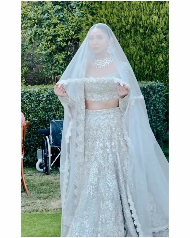 White Bridal Nikkah Dupatta USA with sheer flowing fabric and embroidered border for Pakistani and Muslim wedding celebrations.