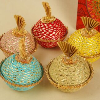 Colorful Potli wedding favor boxes with traditional gold detailing for Pakistani Mehndi, Nikkah and South Asian weddings in the USA.